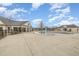 Community pool with splash pad and ample seating for residents to relax and enjoy the summer at 824 Wrights Creek Way, Wake Forest, NC 27587