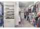 Walk-in closet with rows of shelving and rods at 824 Wrights Creek Way, Wake Forest, NC 27587