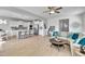 Open-concept living area features a kitchen, living room with hardwood floors, and plenty of space at 90 Rigsby Ave, Four Oaks, NC 27524