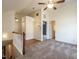 Upstairs hallway boasts plush carpeting and multiple entryways to bedrooms and bathrooms at 916 Belhaven Rd, Cary, NC 27513