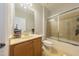 Functional bathroom with a vanity sink and a shower with sliding glass doors at 9211 Calabria Dr # 117, Raleigh, NC 27617