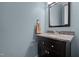 Well-lit bathroom with a granite countertop and vanity sink at 946 Berry Patch Ln, Pittsboro, NC 27312