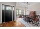 Elegant dining room showcasing coffered ceilings, hardwood floors, and stylish wooden furniture at 946 Berry Patch Ln, Pittsboro, NC 27312