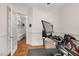 Home gym area with wood floors with a stationary bike, great for exercise and fitness at 946 Berry Patch Ln, Pittsboro, NC 27312