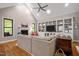 Living room with built-in shelves, fireplace, and a neutral-colored sofa at 946 Berry Patch Ln, Pittsboro, NC 27312