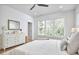 Spacious bedroom with a dresser, soft carpet and a view to the outside at 1012 Addison Pl, Raleigh, NC 27610