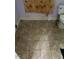 Bathroom with old tile floor and damaged walls, needing significant repair work at 1117 S Blount St, Raleigh, NC 27601
