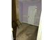 Compact bedroom needing repair work and showcasing a lilac color scheme at 1117 S Blount St, Raleigh, NC 27601