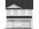 Two-story home showcasing symmetrical design, light siding, and dark roof at 1117 S Blount St, Raleigh, NC 27601