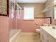 Bathroom with a shower/tub combination and vanity at 118 Park Ave, Knightdale, NC 27545