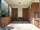 Covered carport featuring brick construction and access to a side entrance at 118 Park Ave, Knightdale, NC 27545