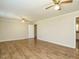 Open-concept living room with hardwood floors, offering a versatile living space at 118 Park Ave, Knightdale, NC 27545