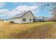 Spacious backyard featuring well-maintained lawn and the home's exterior at 120 Longspur Ln, Rolesville, NC 27571