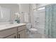 Bathroom featuring modern fixtures, a shower-tub combo, and elegant tile at 120 Longspur Ln, Rolesville, NC 27571