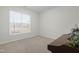 Bedroom featuring a large window providing natural light and serene views at 120 Longspur Ln, Rolesville, NC 27571