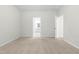 This well-lit bedroom reveals an ensuite bathroom at 120 Longspur Ln, Rolesville, NC 27571