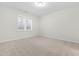 Bright and airy bedroom with a window, neutral walls, and carpeted flooring at 120 Longspur Ln, Rolesville, NC 27571
