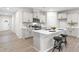 Bright kitchen with a spacious island, stainless steel appliances and a stylish backsplash at 120 Longspur Ln, Rolesville, NC 27571