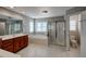 Well-appointed bathroom featuring a soaking tub, separate shower, and vanity with sink at 12321 Penrose Trl, Raleigh, NC 27614
