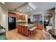 Spacious kitchen with a center island, breakfast bar, and wooden cabinets at 12321 Penrose Trl, Raleigh, NC 27614