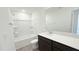 Modern bathroom showcases a shower-tub combo, granite countertops, and sleek hardware at 140 Gobbler Dr, Smithfield, NC 27577