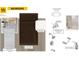 A bathroom design scheme showing a quartz countertop, stainless steel faucets, and dark wooden cabinetry at 140 Gobbler Dr, Smithfield, NC 27577
