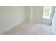 Cozy bedroom with a window, providing a quiet and comfortable space to unwind and personalize at 140 Gobbler Dr, Smithfield, NC 27577