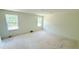 Bright bedroom with two windows, offering a serene space for rest and personalization at 140 Gobbler Dr, Smithfield, NC 27577