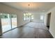 Spacious living room with lots of natural light and sliding door access to backyard at 140 Gobbler Dr, Smithfield, NC 27577