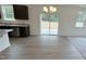 Open concept space with vinyl and carpet and sliding doors to backyard at 140 Gobbler Dr, Smithfield, NC 27577