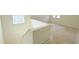 Bright staircase leading to the upper level of the home, ready for its new owners to customize at 140 Gobbler Dr, Smithfield, NC 27577