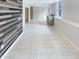 Finished basement with tile flooring, sink, and stylish wood accent wall at 143 George Wilton Dr, Clayton, NC 27520