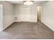 Bedroom with gray carpet, ceiling fan, and closet at 143 George Wilton Dr, Clayton, NC 27520