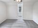 Spacious bedroom featuring soft gray carpet and a window for natural light at 143 George Wilton Dr, Clayton, NC 27520