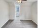 Bedroom featuring soft gray carpet, a ceiling fan, and a window for natural light at 143 George Wilton Dr, Clayton, NC 27520