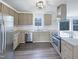 Updated kitchen with stainless steel appliances, granite countertops, and new cabinets at 143 George Wilton Dr, Clayton, NC 27520