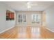 Inviting living room featuring hardwood floors, neutral walls, and plenty of sunlight at 144 Sabiston Ct, Cary, NC 27519