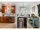 Eat-in kitchen boasts a kitchen island and stainless steel dishwasher providing function and style to the space at 153 Dell Meadows Pl, Four Oaks, NC 27524