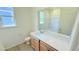 Bathroom with a large vanity, mirror, and modern toilet at 158 Gobbler Dr, Smithfield, NC 27577