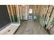 Unfinished bathroom featuring unfinished walls and ceiling, a shower, and rough-in plumbing at 158 Gobbler Dr, Smithfield, NC 27577