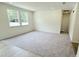 Bright carpeted bedroom featuring plenty of natural light at 158 Gobbler Dr, Smithfield, NC 27577
