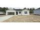 Charming, newly constructed single-Gathering home featuring a two-car garage and modern design elements at 158 Gobbler Dr, Smithfield, NC 27577