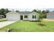 Charming single story home with a 1 car garage, well kept lawn and landscaping at 158 Gobbler Dr, Smithfield, NC 27577
