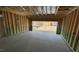 Unfinished garage area awaiting finishing, including flooring and paint at 158 Gobbler Dr, Smithfield, NC 27577