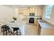 Open kitchen featuring stainless steel appliances, granite countertops, and ample cabinet space at 158 Gobbler Dr, Smithfield, NC 27577