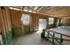 Spacious living room featuring a sliding glass door and several windows for natural light at 158 Gobbler Dr, Smithfield, NC 27577