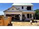 New construction home's exterior view showcasing the two-story layout in the process of being built at 183 W Saltgrass Ln, Smithfield, NC 27577