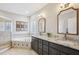 This bathroom features a soaking tub, separate shower, and dual vanity with granite countertops at 22 Hill Row Ln, Clayton, NC 27527