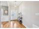 Bright foyer boasting hardwood flooring, decorative lighting, and a welcoming ambiance at 22 Hill Row Ln, Clayton, NC 27527