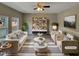 Bright living room featuring modern furnishings, stylish decor, and hardwood floors at 2412 Little John Rd, Raleigh, NC 27610